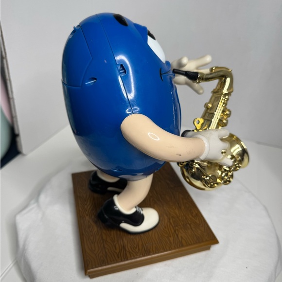 Vintage Blue M&M Candy Dispenser with a Saxophone. (C) - Picture 4 of 5